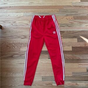 Adidas Red Track Pants with White Stripes